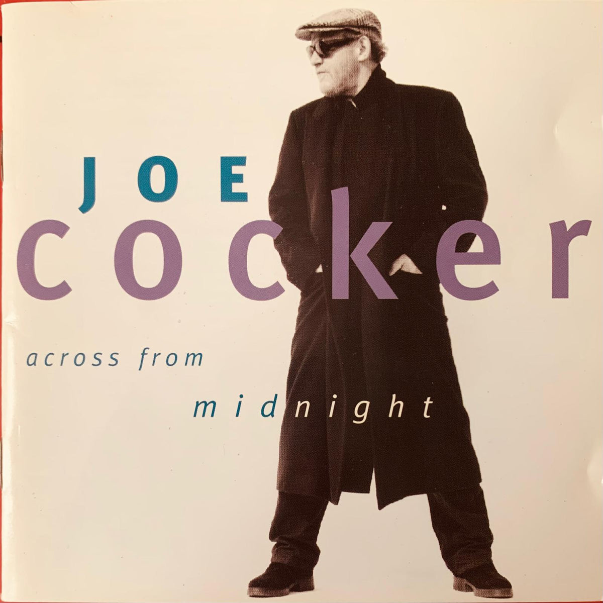 Joe cocker across from midnight original cd with sepia-toned photo of the artist in dark coat and flat cap
