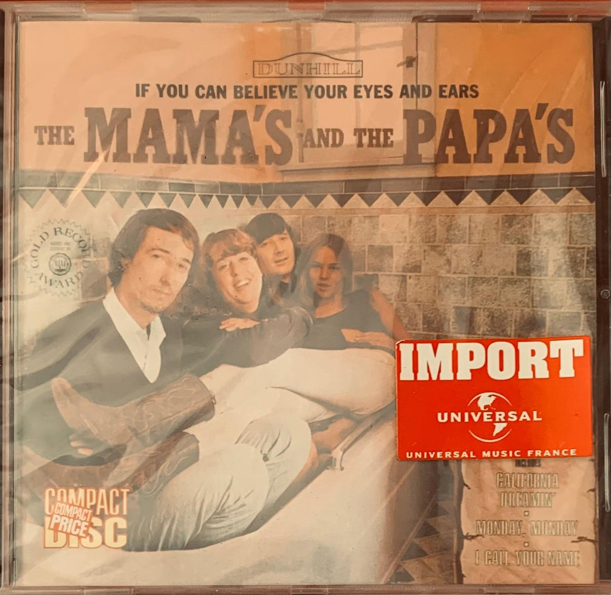 The mamas and the papas original cd album cover with vintage sepia photo and bold black lettering on brick wall background