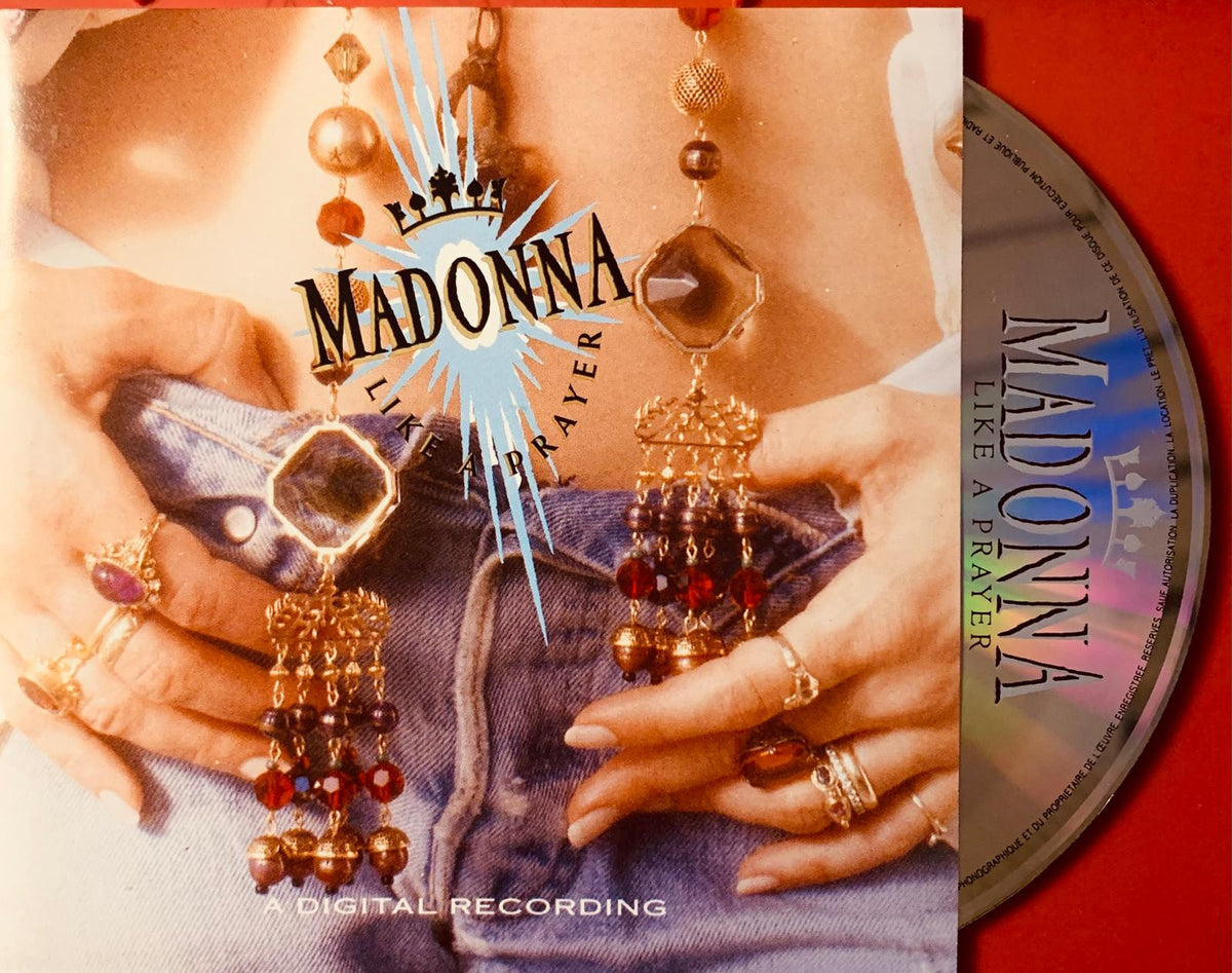 Gold-toned beaded chandelier earrings with red and amber gemstones featured in madonna like a prayer original cd product