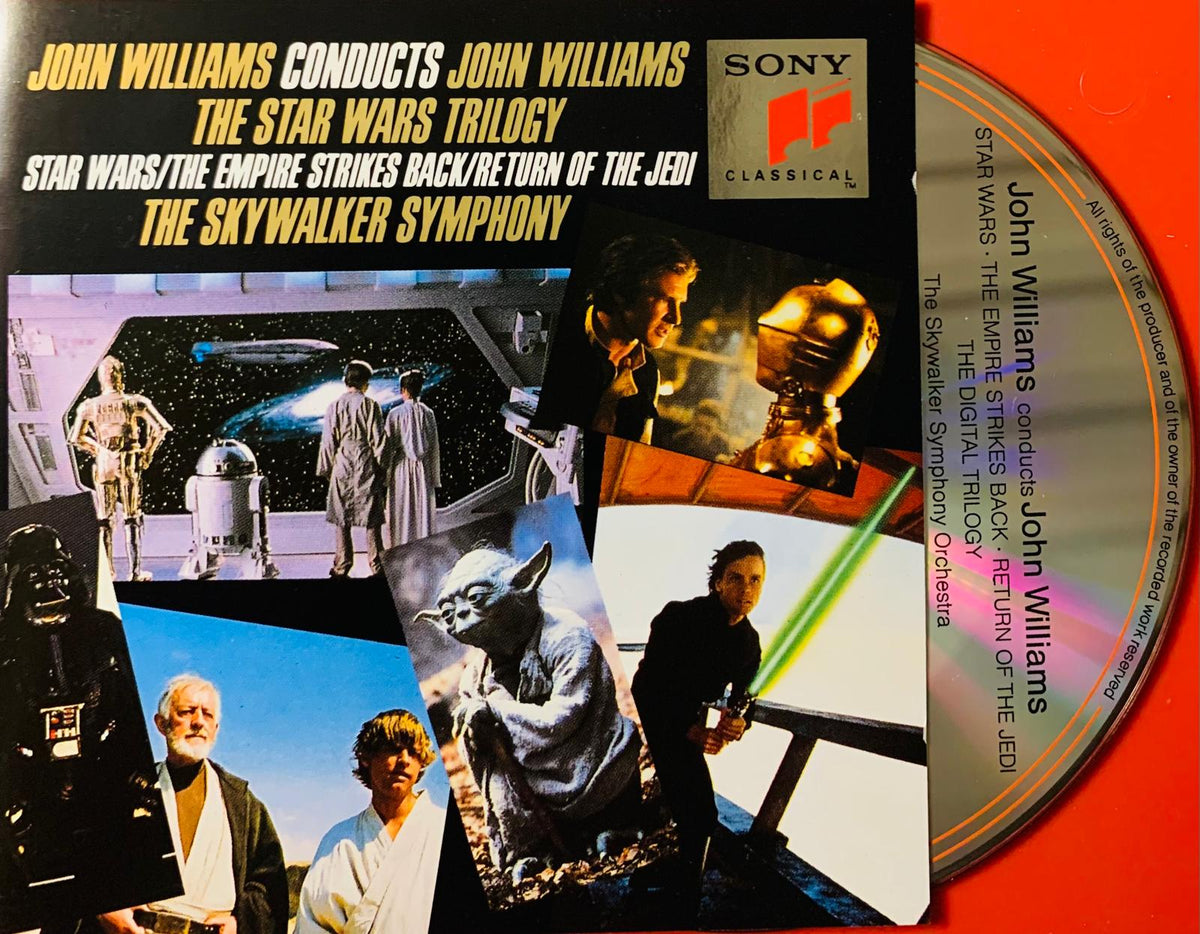 Sony classical cd featuring john williams conducting star wars trilogy with collage of iconic characters and scenes