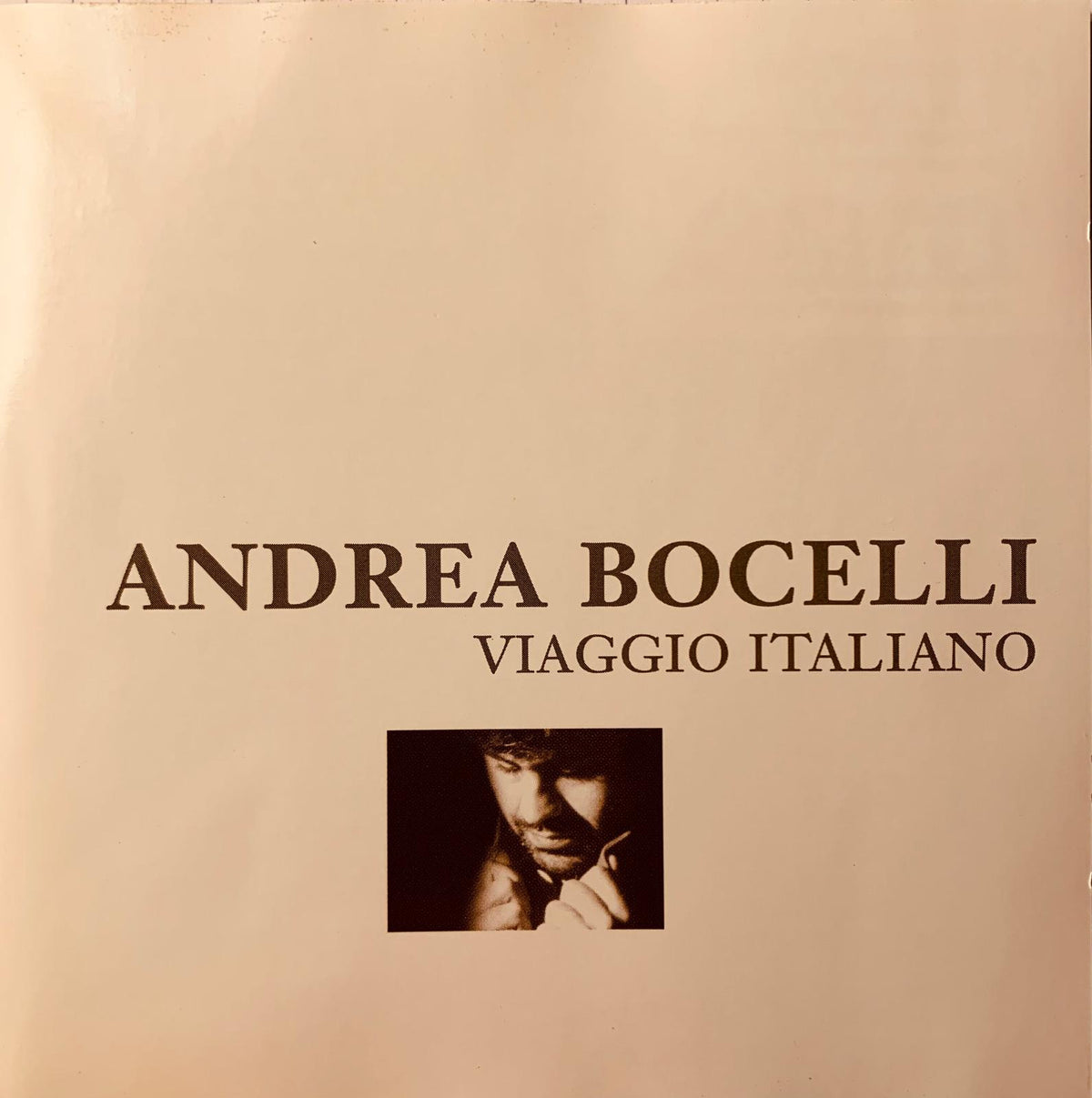 Cream-colored vinyl record sleeve featuring andrea bocelli album viaggio italiano for italian music collection