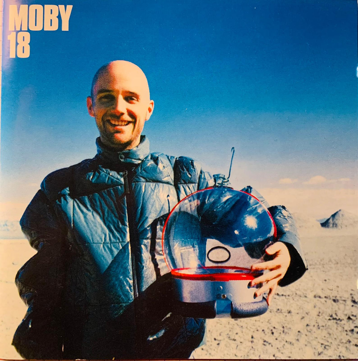 Blue and red transparent dome helmet with metallic base from moby 18 original cd product collection