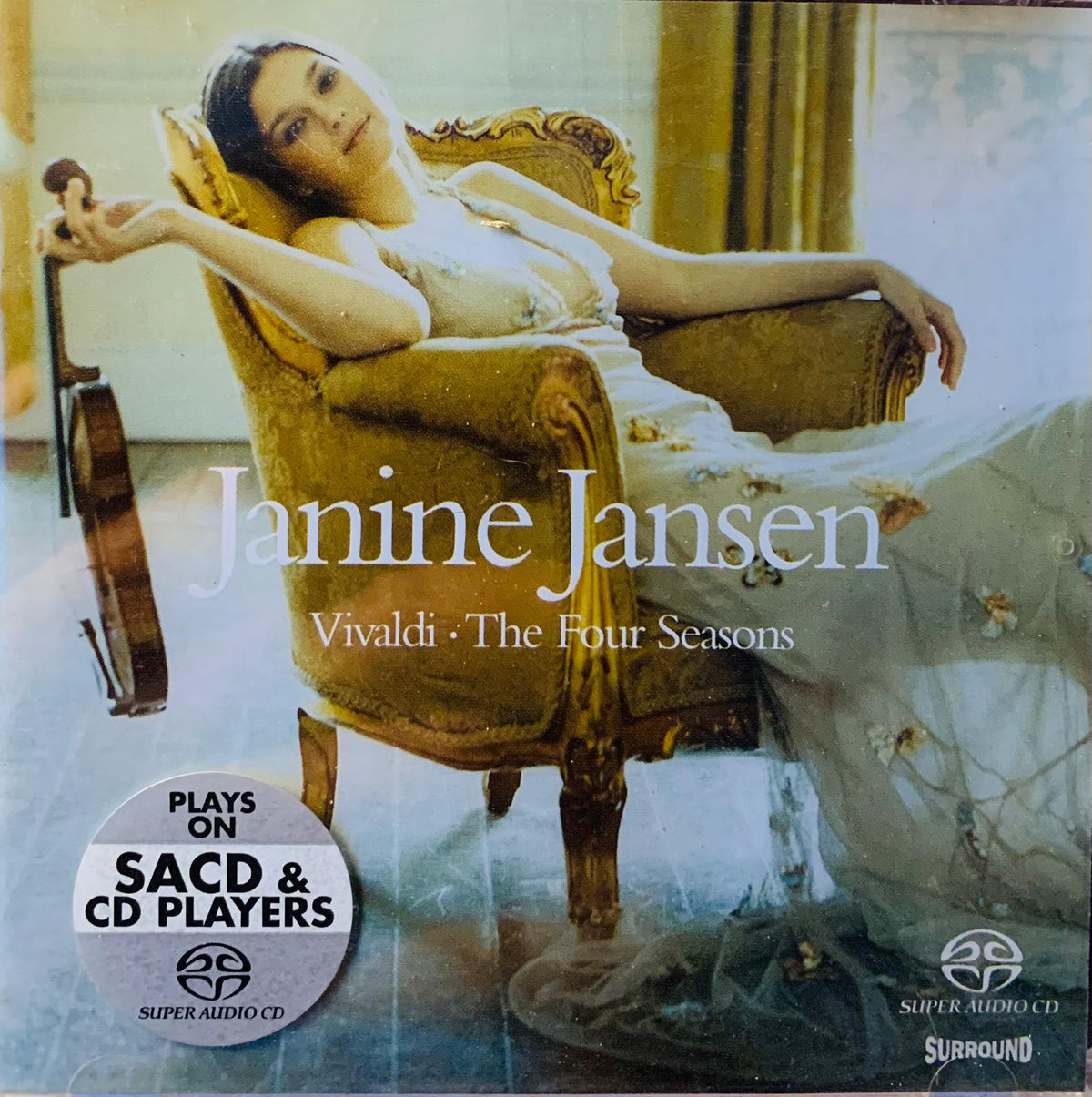 Janine Jansen super audio CD album cover featuring a woman in an ornate gold chair holding a violin for Vivaldi The Four Seasons