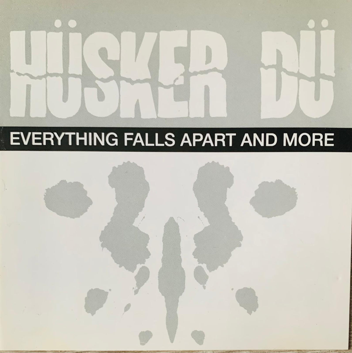 Hüsker Dü everything falls apart and more original CD with bold white lettering on gray background and inkblot design