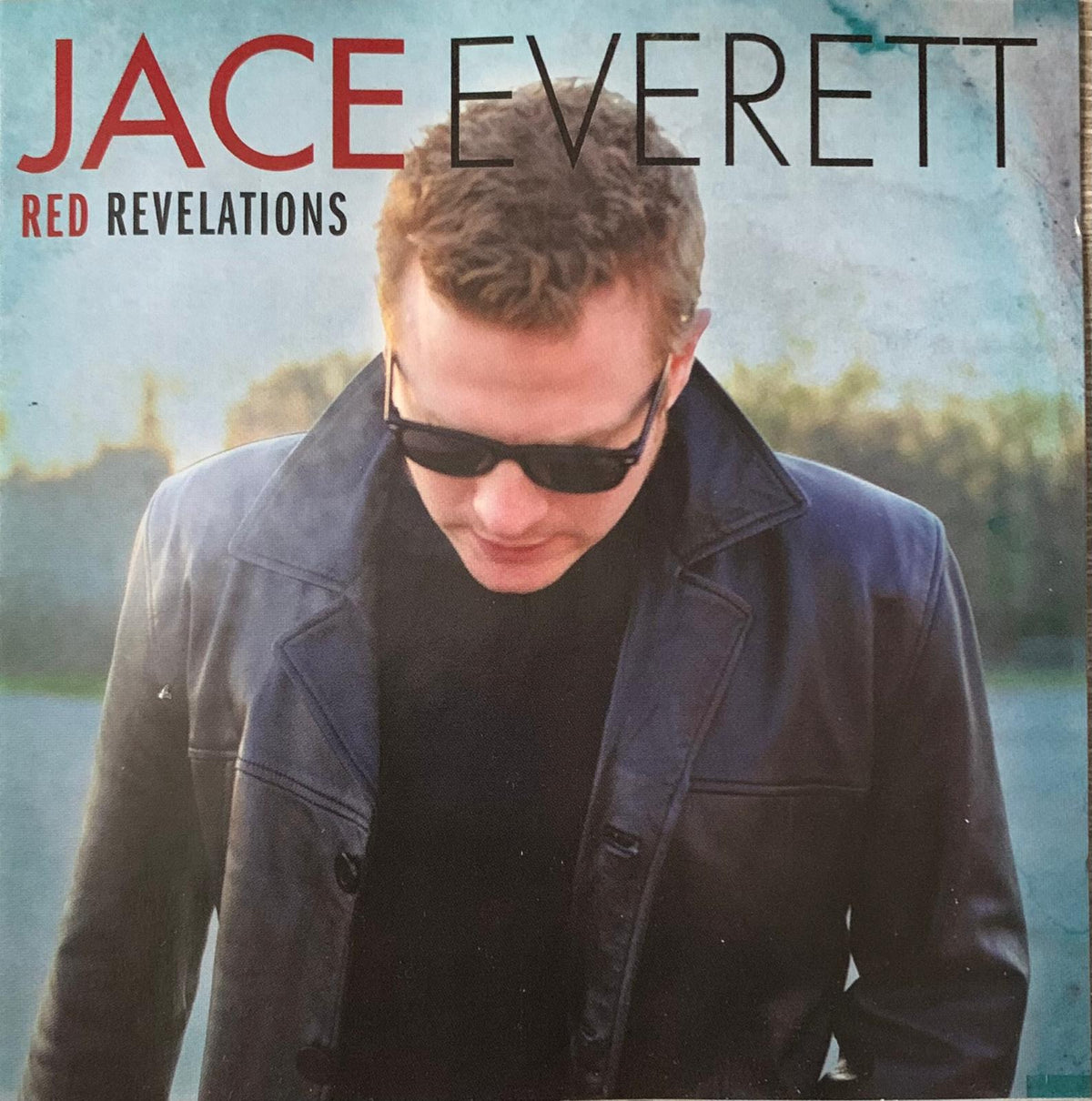 Jace Everett red revelations original CD featuring a man in black leather jacket and dark sunglasses on cover