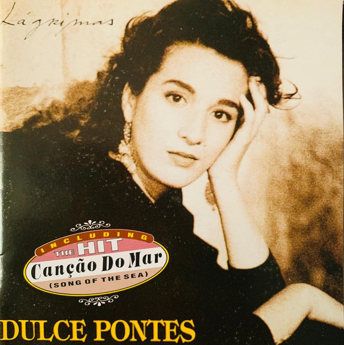 Sepia toned album cover of dulce pontes lágrimas original cd featuring woman with dark curly hair and elegant earrings