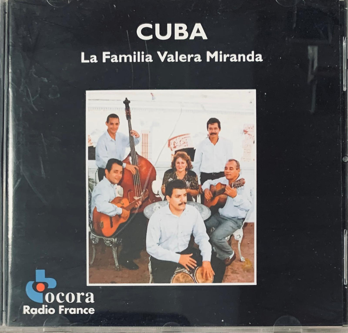 Black cd case featuring a photo of the Cuban band la familia valera miranda on the cover for various artists Cuba CD