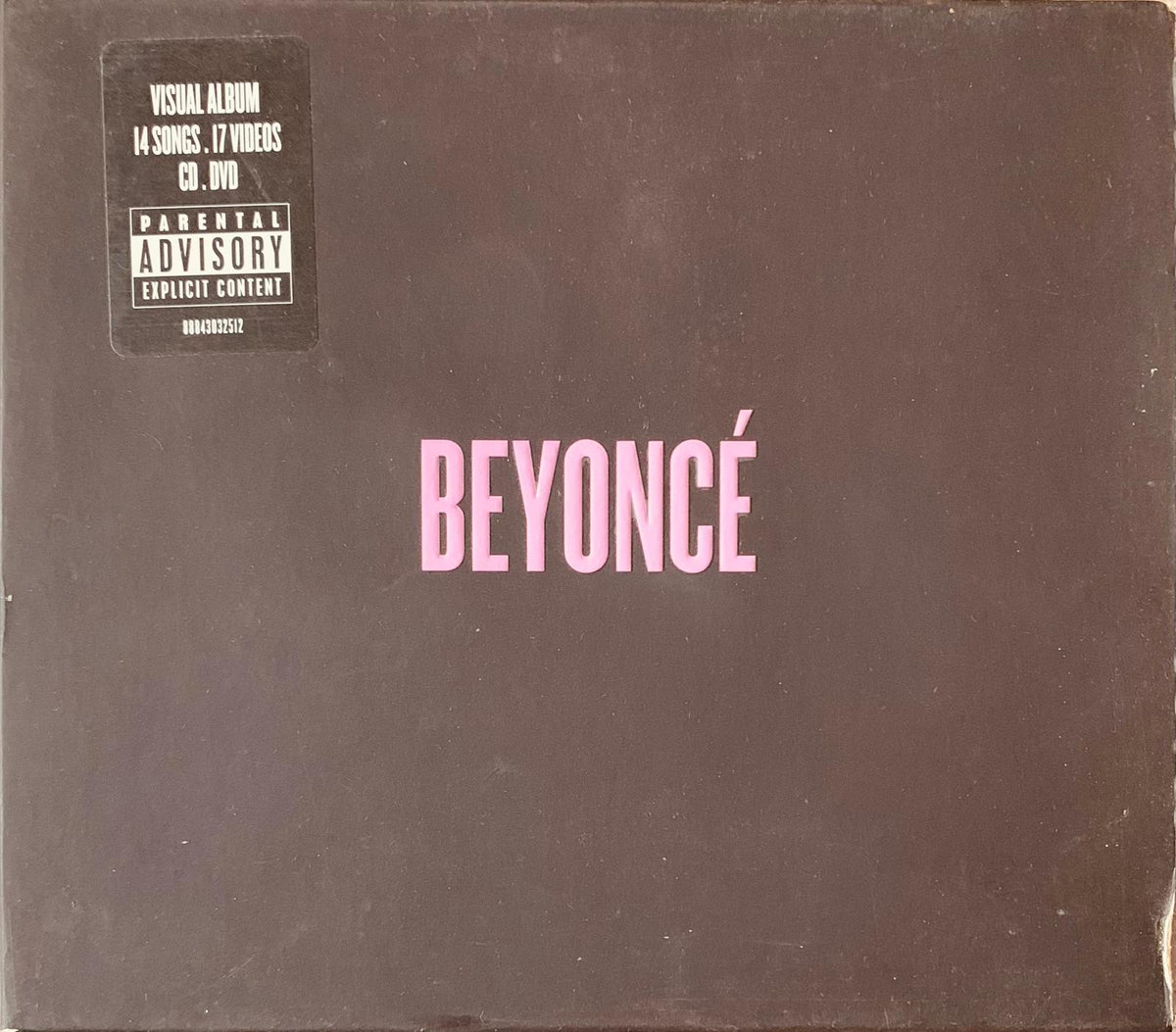Dark brown cd album cover featuring the name beyoncé in bold pink lettering for beyoncé visual album 2013