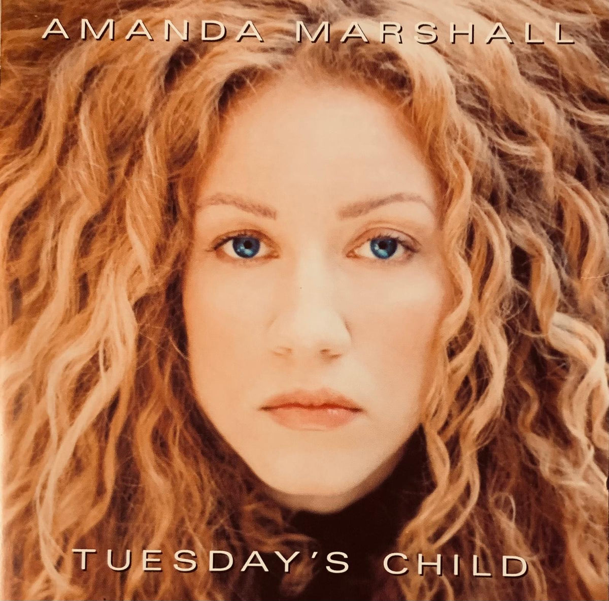 Amanda Marshall Tuesday’s Child 1999 original CD cover with close-up portrait and golden-brown curly hair