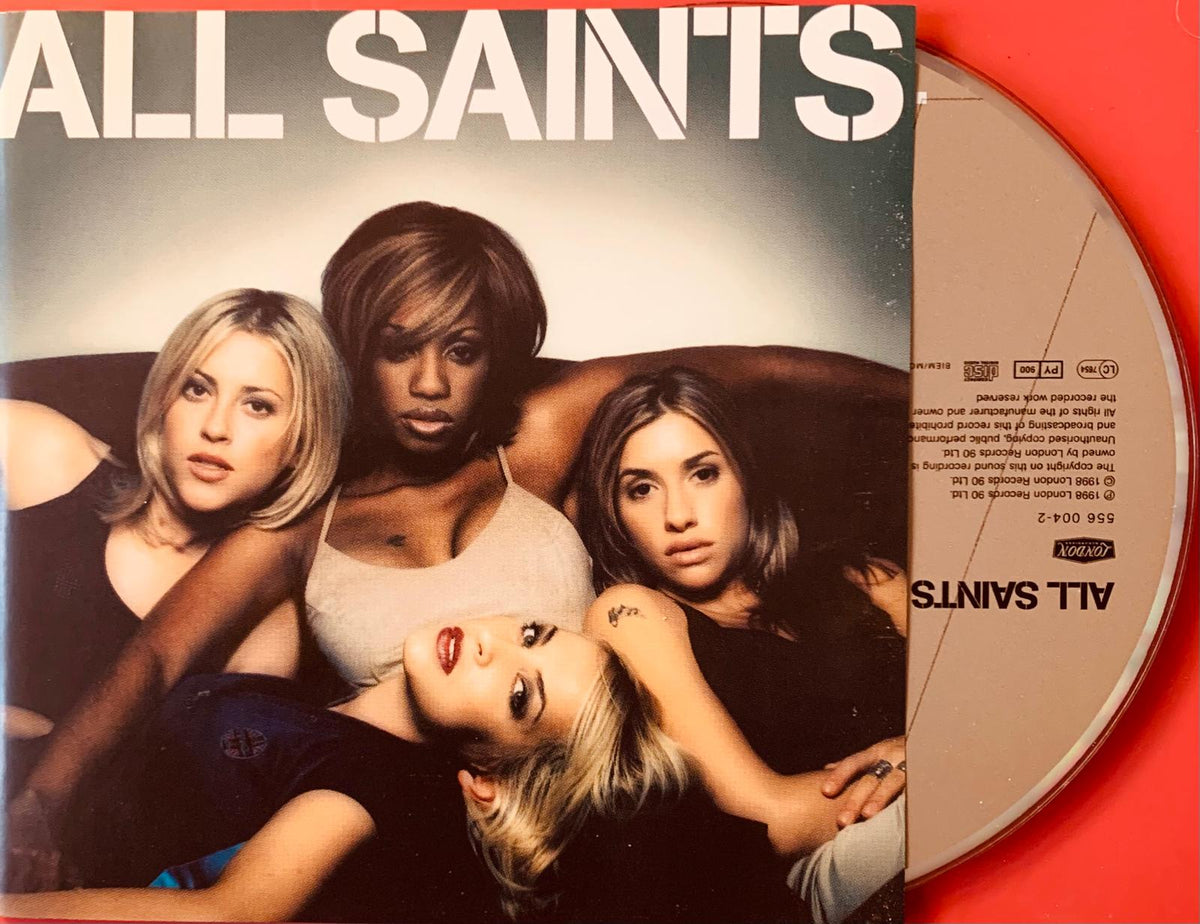 Red vinyl record sleeve for all saints album featuring band photo and white text on the cover