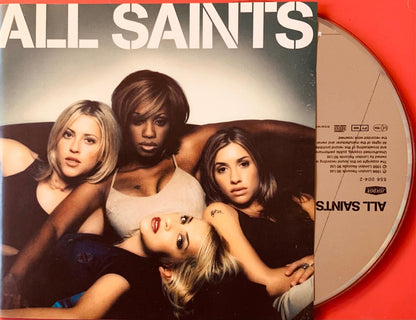 Red vinyl record sleeve for all saints album featuring band photo and white text on the cover
