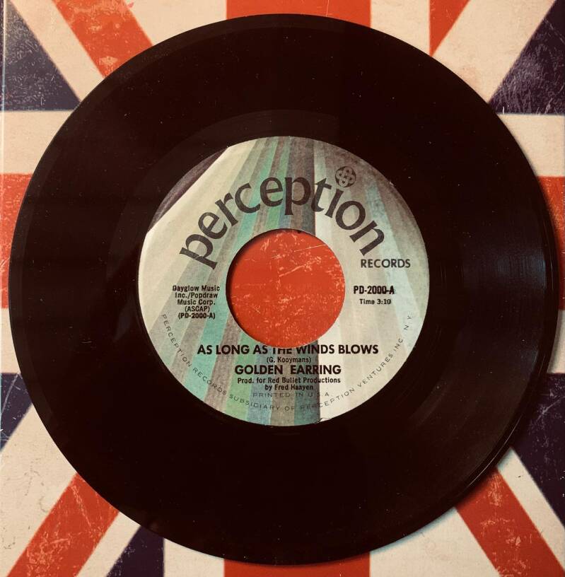 Black vinyl 7 inch record with white and orange perception records label featuring as long as the winds blow by golden earring