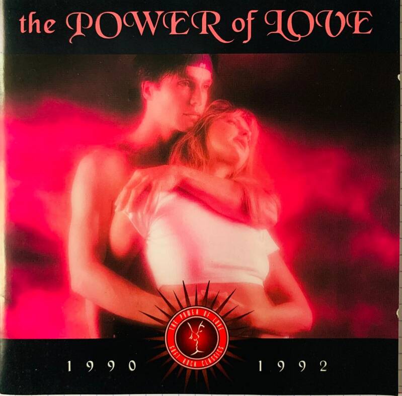 The power of love 1990-1992 cd by yves saint laurent features a red-tinted image of a man and woman embracing