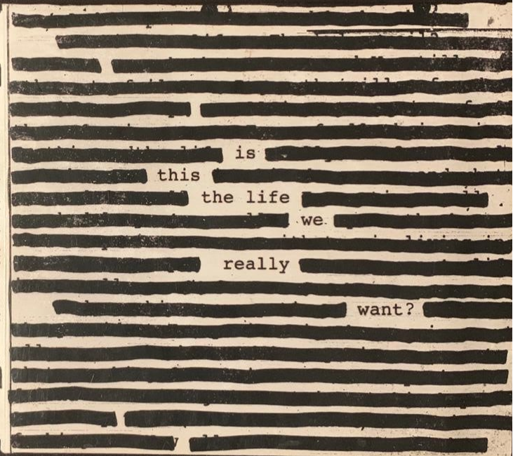 Black and white typewriter text on textured background reading is this the life we really want on roger waters cd back cover