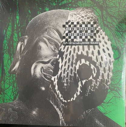 Millionaire Sciencing — M Scellé / Sleeve: M (ما زال مختوماً، ولكن الغلاف البلاستيكي ممزق قليلاً)