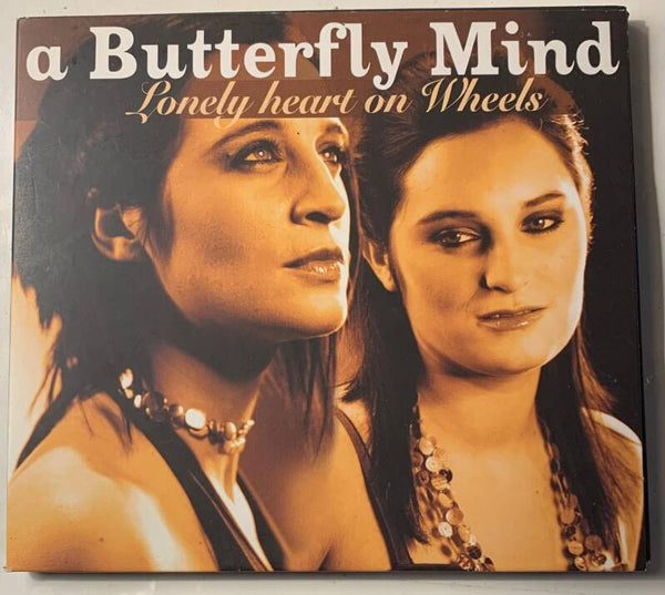 A BUTTERFLY MIND أسطوانة Lonely heat on Wheels مدمجة